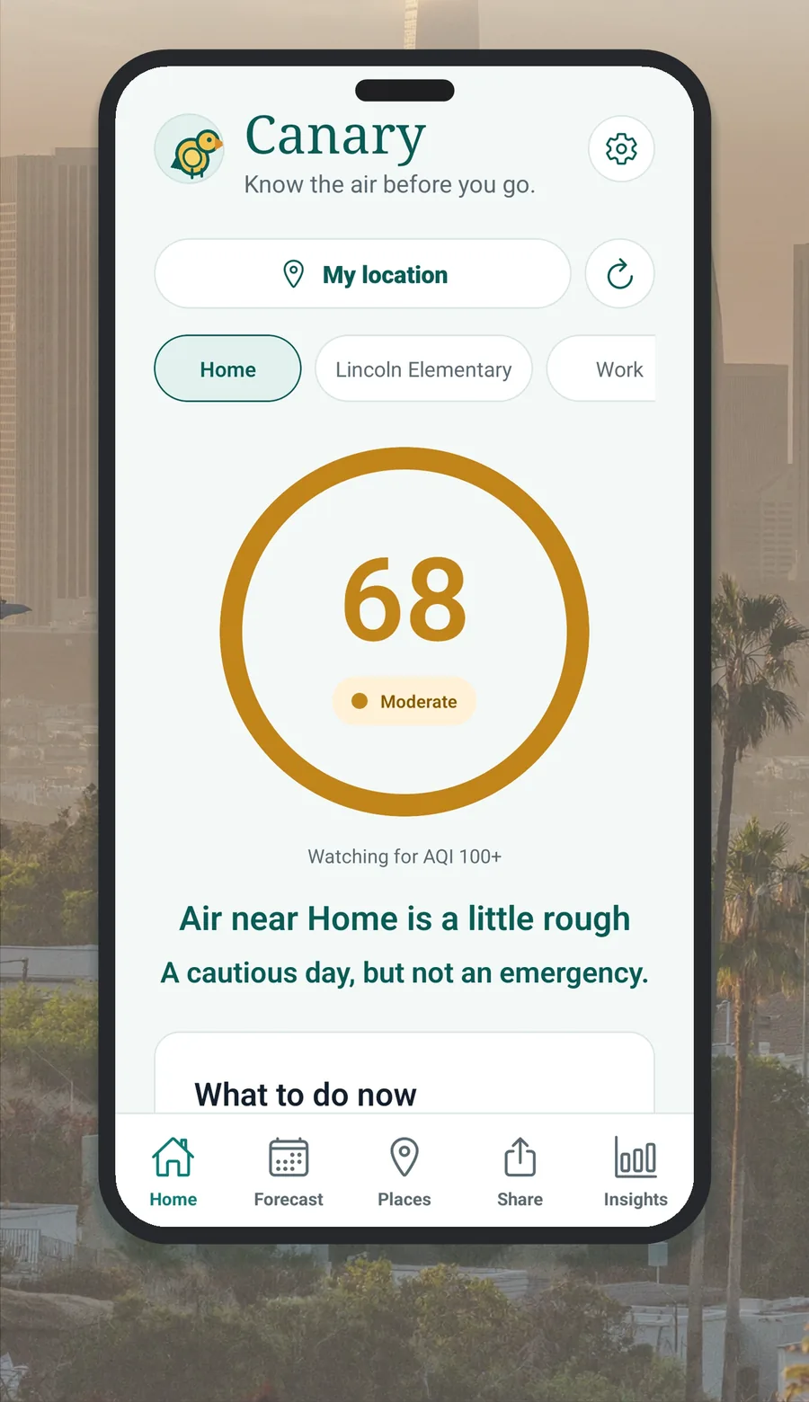 Canary home screen over a hazy Los Angeles skyline